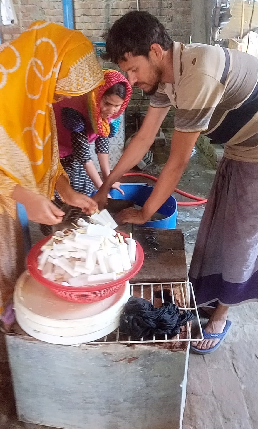 a man cooking food on a table