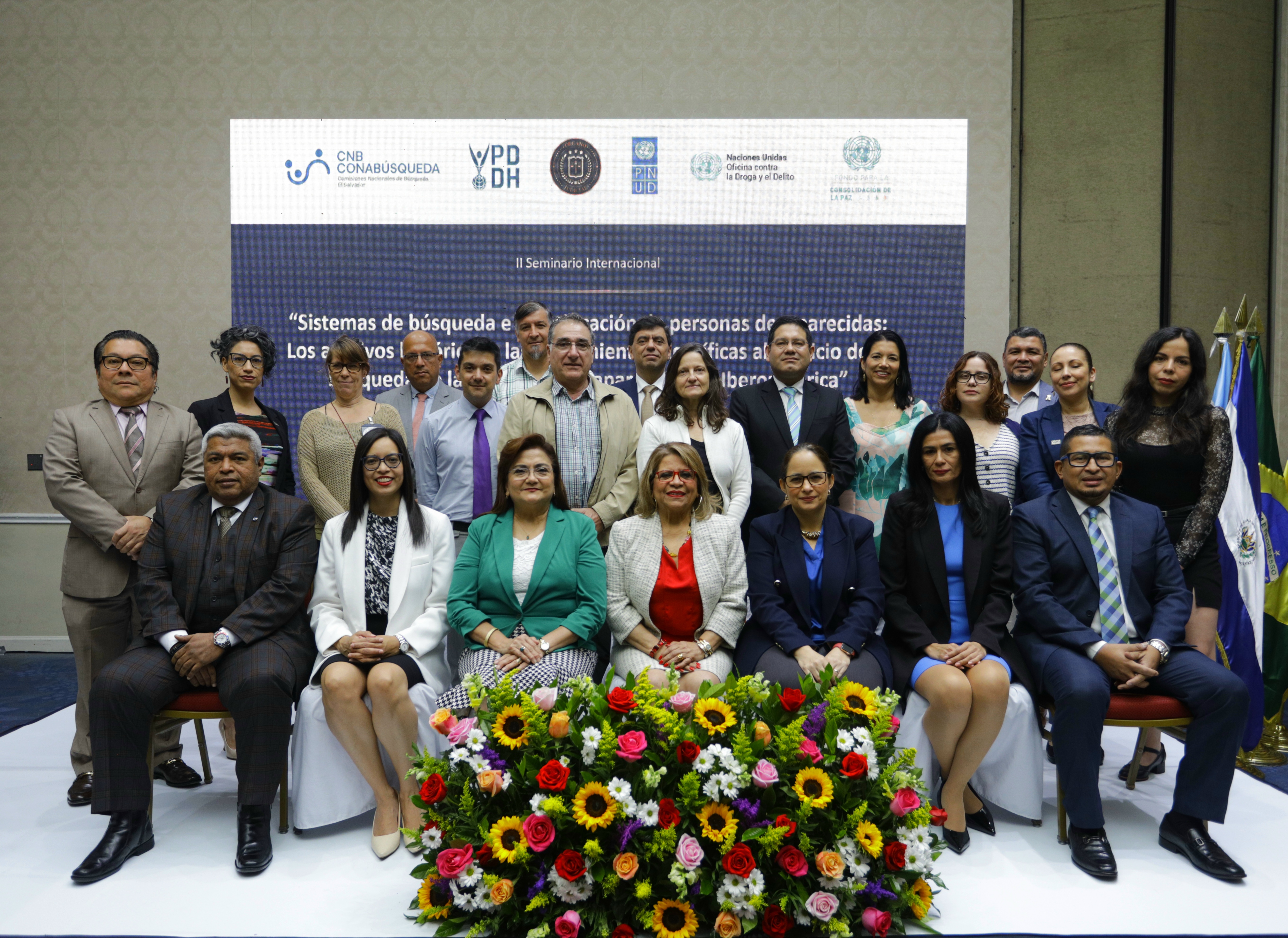 a group of people posing for the camera