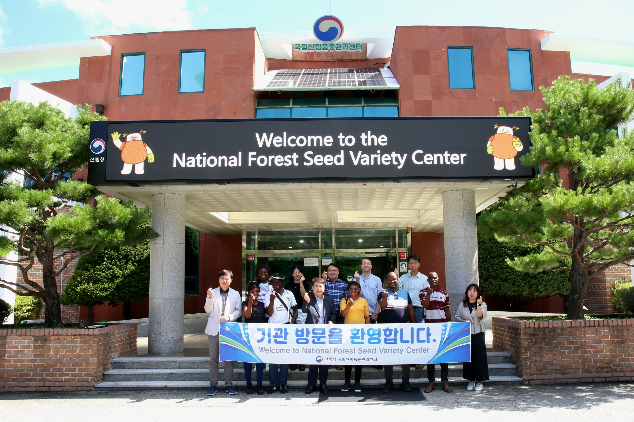 a group of people standing in front of a building