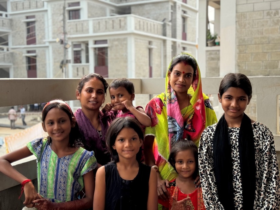 a group of people posing for the camera