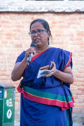 a lady giving a speech
